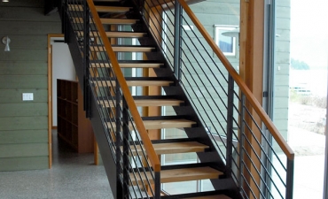 Stair maintains the open feeling of the space